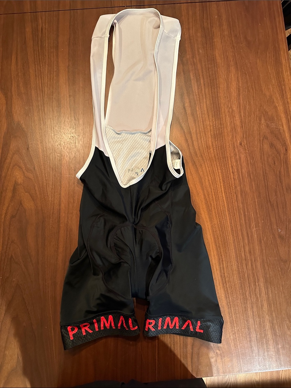 Primal Men’s Black Athletic Bib Shorts with Red Logo